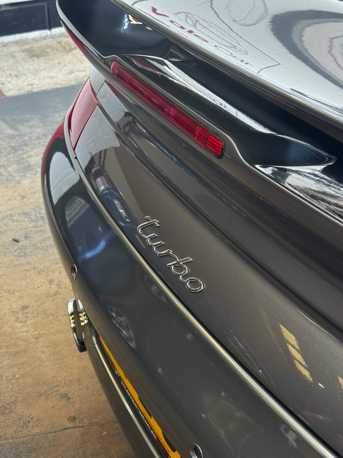 Ceramic coat result showing deep shine and paint protection on vehicle