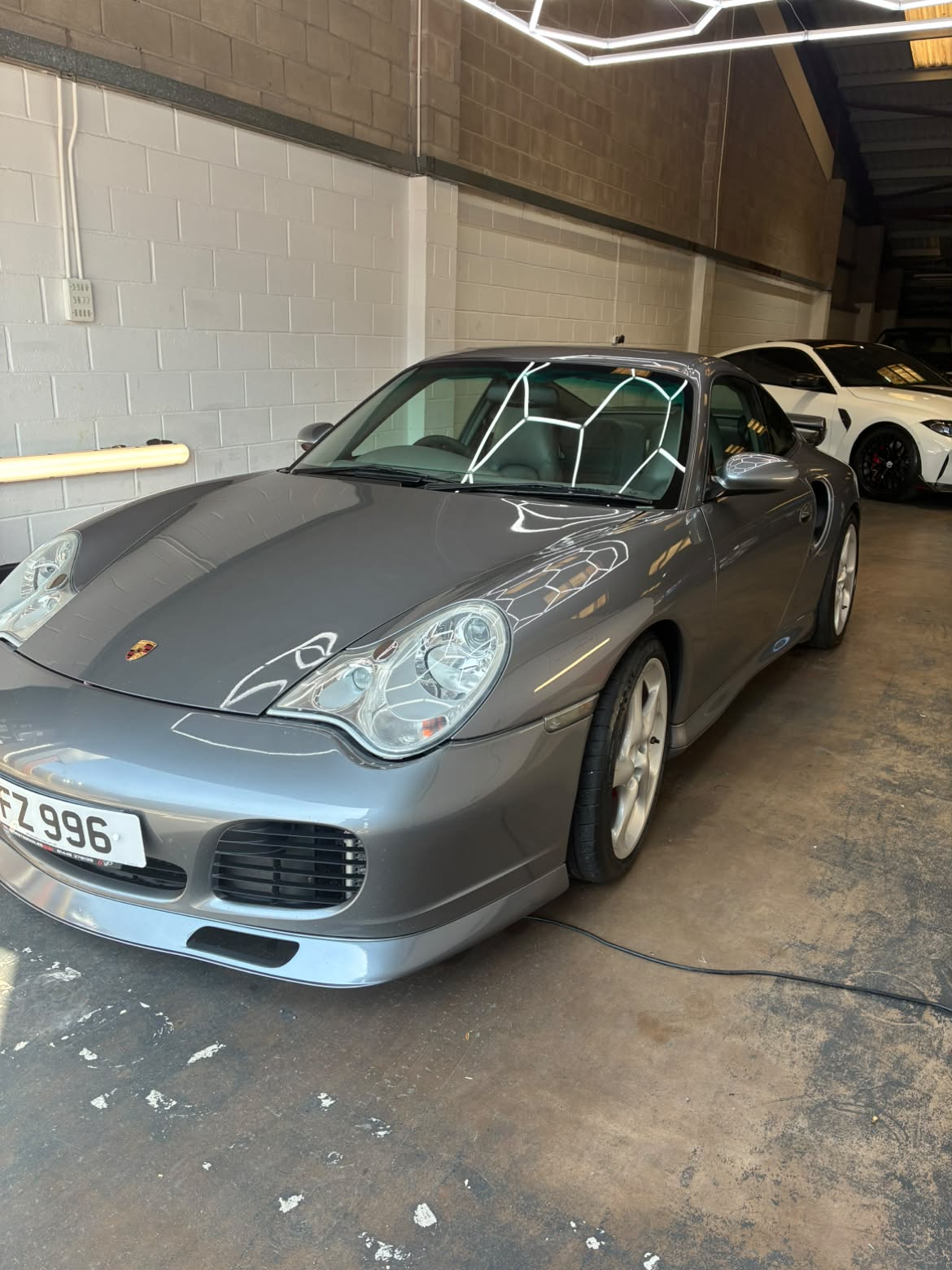 Close-up exterior detail showing flawless paintwork and gloss