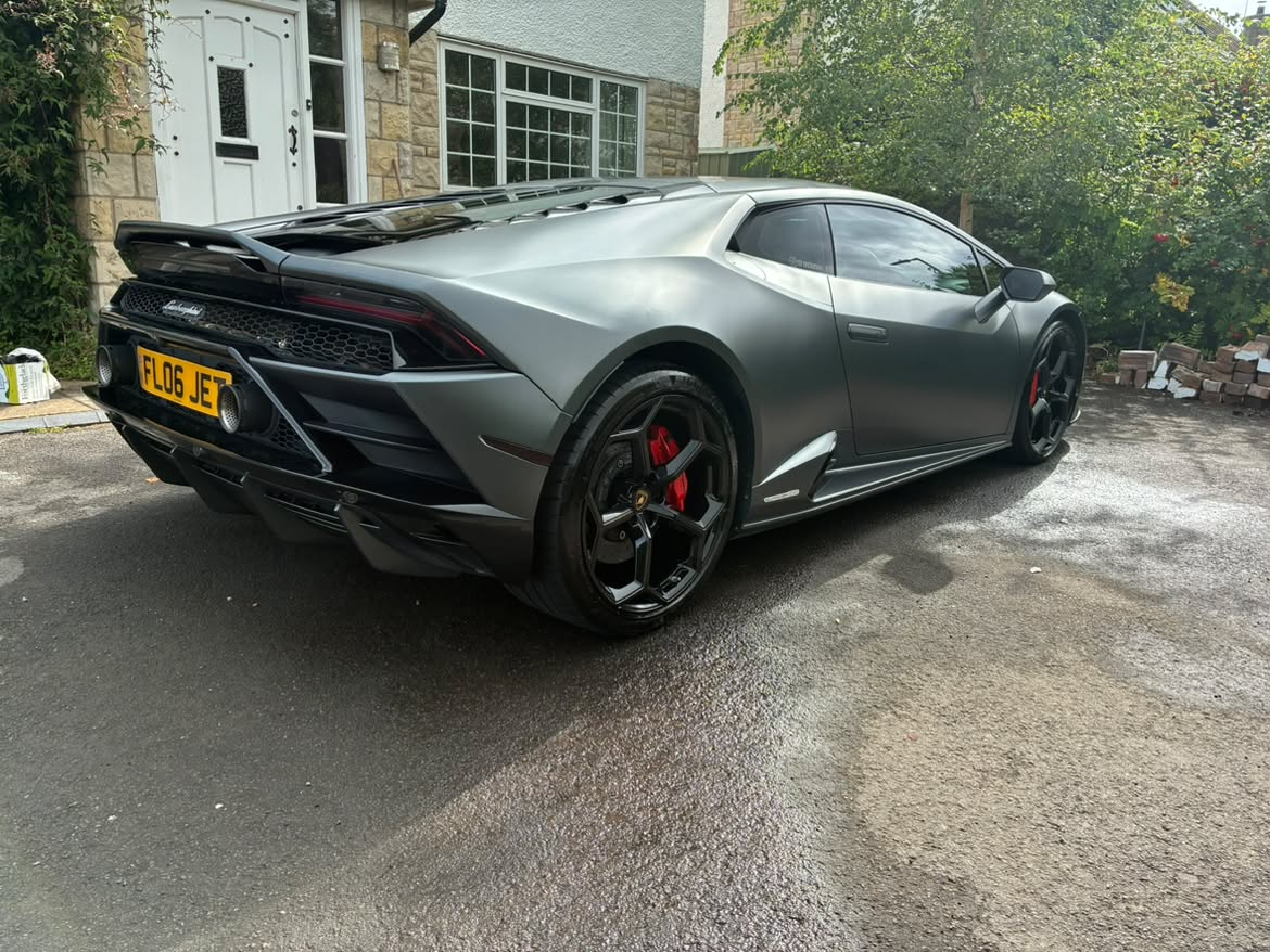 Mirror finish on vehicle paintwork after professional detailing and polish treatment